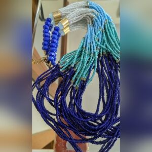 Elegant Shades of Blue And White 20 String Beaded Necklace.